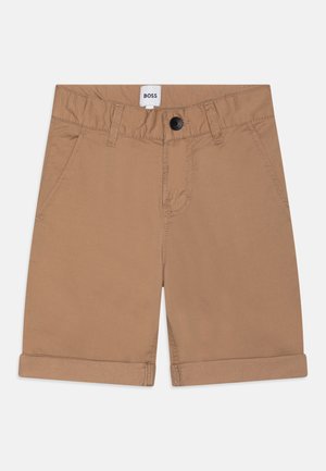 Shorts di cotone color sabbia con orlo arrotolato, dotati di tasche frontali e chiusura con bottone nero, etichetta con marchio nella cintura.