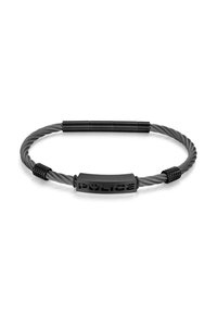 Bracciale in cavo nero con piatto centrale in metallo nero inciso con la scritta "POLICE", fissato con dettagli neri texturizzati.