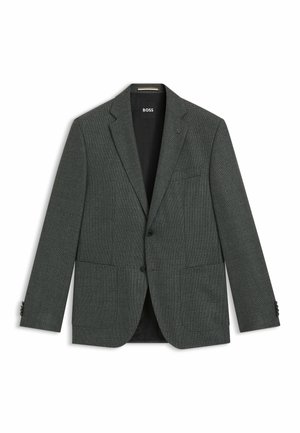 Grijze blazer van een geweven stof. Heeft een gelapte revers, twee voorzakken en knopenmanchetten. Merkennaam "BOSS" zichtbaar op de kraag.