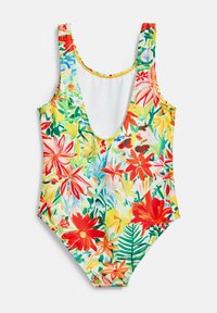 Maillot de bain une pièce avec un motif floral vif en rouge, jaune et vert. Fabriqué en tissu doux et extensible avec un design à dos bas.