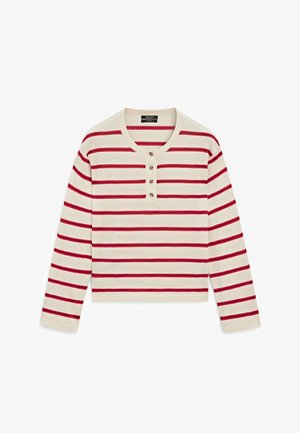 Crèmekleurig hemd met lange mouwen en horizontale rode strepen, een ronde halslijn en drie houten knopen op de voorkant.