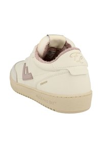 Cream-colored leather sneaker with beige sole, pink inner lining, "STADION" and "FL" branding, angled to show back and side view.
