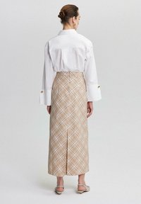 Touché Privé Fustă maxi - beige