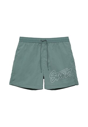 Grüne Badehose mit elastischem Bund, Kordelzug und weißem stilisiertem Logo am unteren linken Bein.