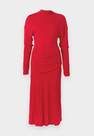 Vestido vermelho de manga comprida com gola alta falsa, detalhes franzidos de um lado e saia fluida, feito de tecido elástico para maior conforto.