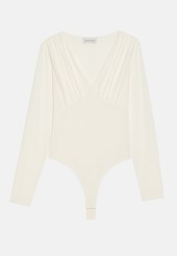 Long-sleeve bodysuit in cream, featuring a deep V-neck, gathered texture at the shoulders, and a thong bottom design. Soft, stretchy fabric.
