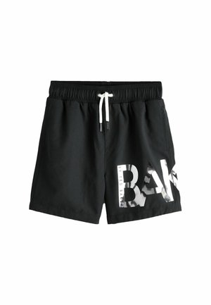 Black swim shorts with an elastic waistband, white drawstring, and glossy silver branding on the left leg. Smooth fabric with a standard fit.