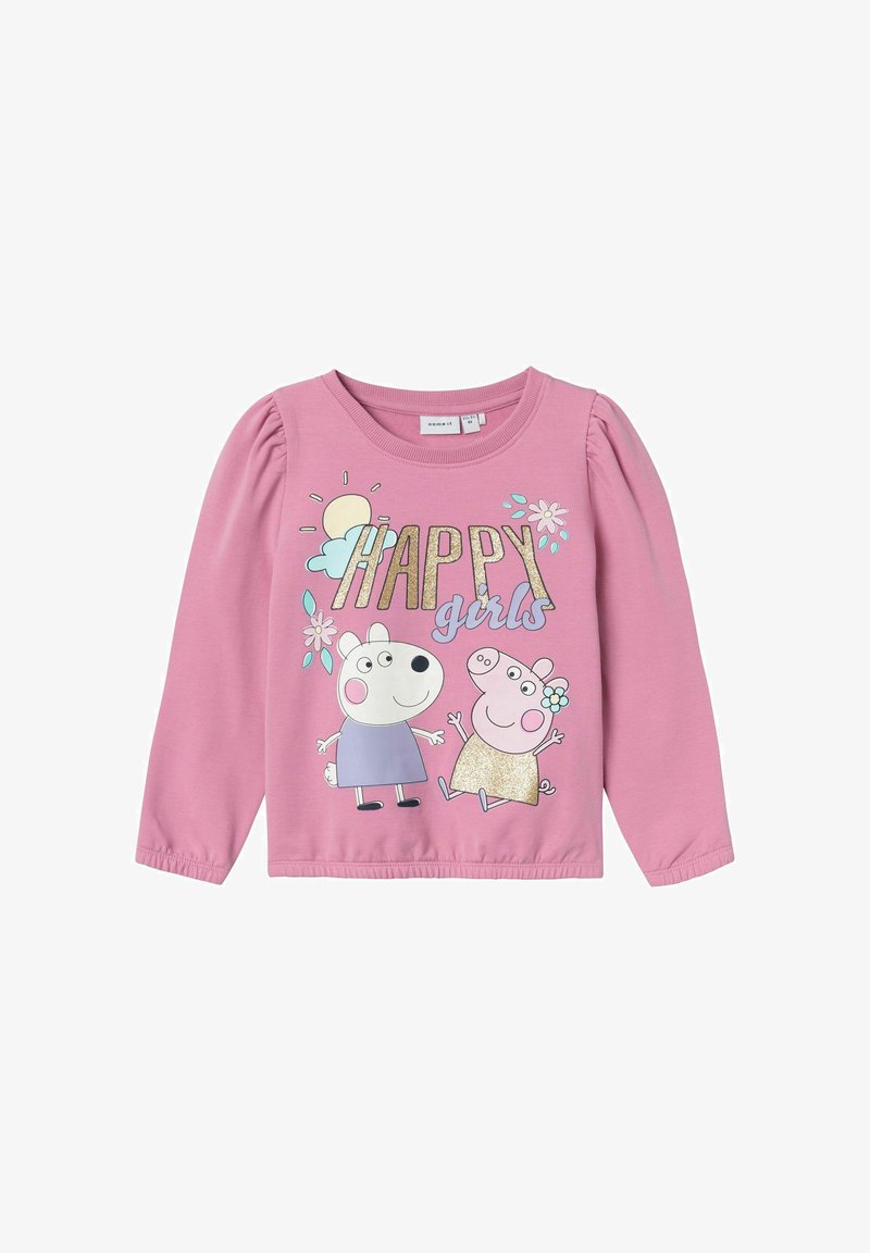 Vaaleanpunainen pitkähihaine paita, jossa on kimaltava "HAPPY girls" -teksti sekä pyöreäkasvoisia sarjakuvahahmoja, kukkia ja auringonkoristeita.