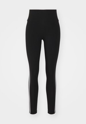 Mustad musta spordipüksid kõrge vöökoha ja valgete külje triipudega, sileda tekstuuri ja tiheda disainiga, sobivad aktiivseks kasutamiseks.