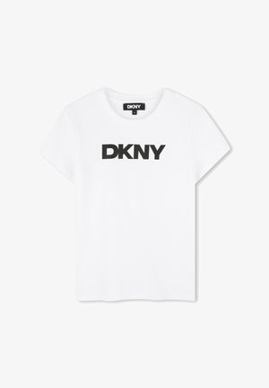 T-shirt en coton blanc à manches courtes et col rond. Présente un logo noir « DKNY » audacieux sur la poitrine. Coupe droite classique.