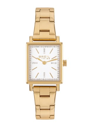 Guldfarvet rektangulært ur med en hvid urskive, krystal accenter rundt om bezellet og en guldfarvet metal link-rem. Enkle timeindikatorer.