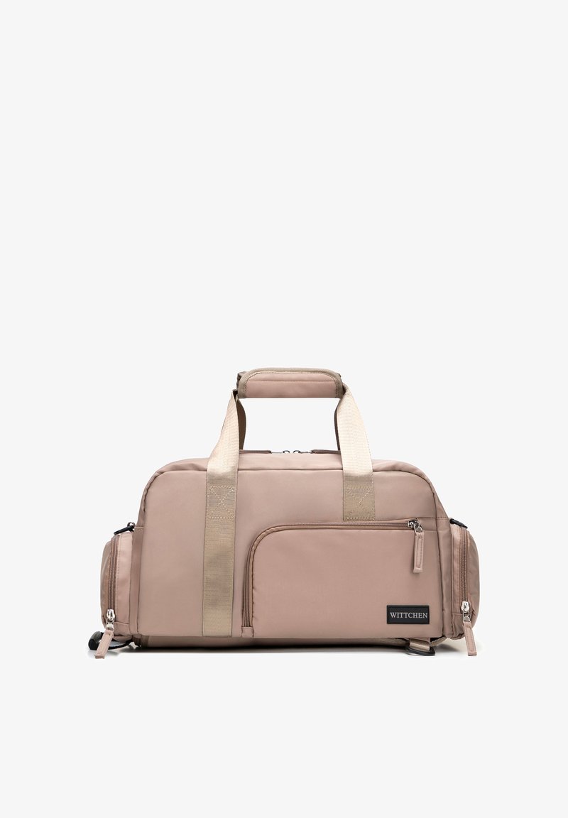 Borsa da viaggio rettangolare beige con doppi manici, tasca anteriore con zip, scomparti laterali e etichetta del marchio "WITTCHEN" sulla tasca anteriore.