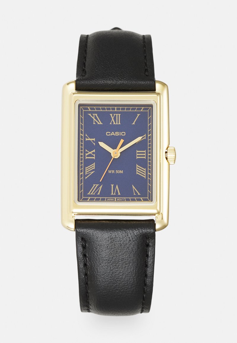 Montre-bracelet rectangulaire en or avec un cadran bleu foncé, des chiffres romains et un bracelet en cuir noir. Étanche jusqu'à 50 mètres.