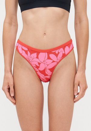 Red bikini bottom with a floral pattern in pink, featuring a low rise cut and elastic waistband. Smooth texture, suitable for beachwear.