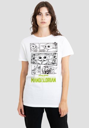 White T-shirt with black comic-style panels featuring Baby Yoda illustrations, and green "Star Wars The Mandalorian" text below.