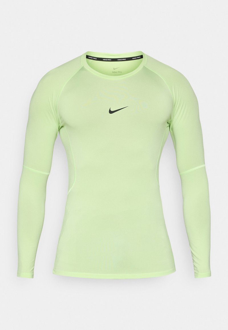 Langärmeliges Nike Pro Shirt aus neongrünem Stoff, mit figurbetontem Schnitt, rundem Ausschnitt und schwarzem Nike-Logo auf der Brust.