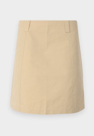 Bežinė medvilninė sijonas su tiesia forma, su priekinėmis raukšlėmis, šoninėmis kišenėmis ir siūlėse siuvinėtomis detalėmis.