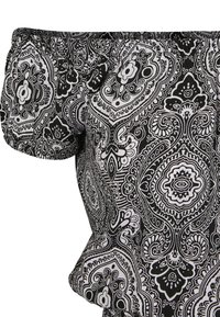 Top con spalle scoperte caratterizzato da un motivo paisley nero e bianco intricato, con scollo elastico e maniche a sbuffo per un aspetto strutturato.