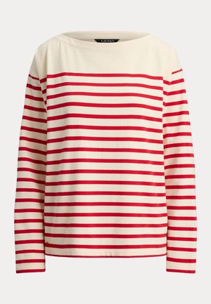 Lange mouwen, crèmewit shirt met rode horizontale strepen en een boothals.