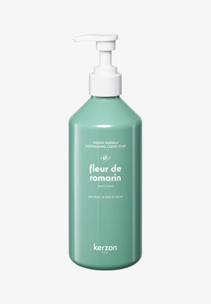 Mintgroene fles afwasmiddel met een witte pomp. Etiket bevat tekst in het wit, waarin de geur en ingrediënten worden beschreven.