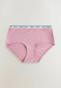 Braguitas de algodón rosa para mujer con cintura elástica blanca que presenta el texto negro "NEXT" repetido, extendidas sobre una superficie clara.