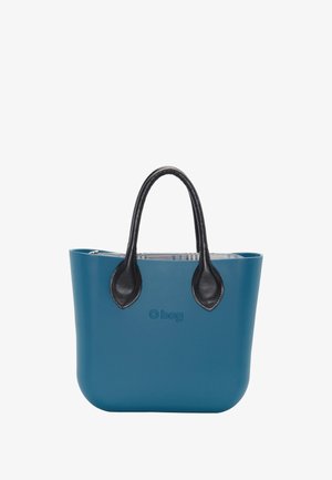 Sac à main bleu avec des poignées en cuir noir, une pochette intérieure zippée et le logo "O bag" embossé à l'avant.