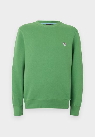 Πράσινο φούτερ με μακριά μανίκια και στρογγυλή λαιμόκοψη, με ριμπ τελειώματα στα μανίκια και στη βάση, διακοσμημένο με ένα μικρό πολύχρωμο σχέδιο ζέβρας στο πάνω αριστερό μέρος του στήθους.