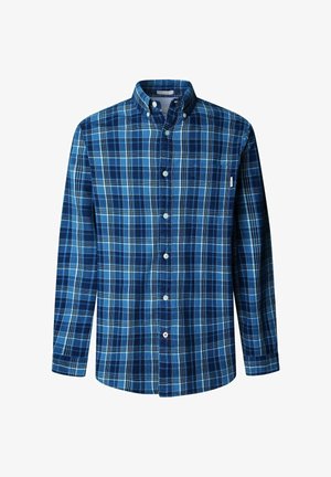 Zils kvadrātveida garām piedurknēm pogājams krekls ar apkakli. Iezīmējas ar tumši ziliem un gaiši ziliem kvadrātiem, priekšējo kabatu un baltām plastikāta pogām.