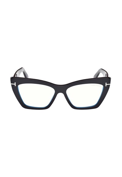 Lunettes œil de chat noires avec des montures épaisses, logo argenté en forme de "T" sur les branches, et verres transparents sur fond blanc.