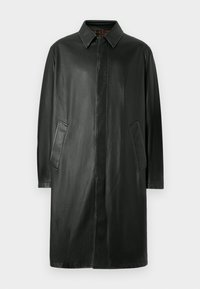 Schwarzer Lederanzug mit einem Kragenhals, langen Ärmeln und Seitentaschen. Glatte Textur und geradliniges Design.