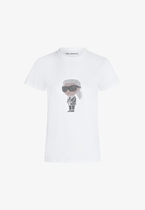 Biele bavlnené tričko s čierno-sivým karikatúrnym dizajnom postavy s okuliarmi a oblekom. Okrúhly výstrih, krátke rukávy.