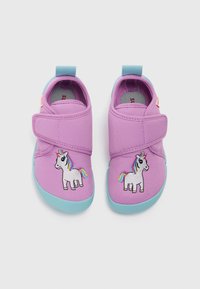 Purple fabric shoes with a turquoise sole, featuring a side-stitched rainbow unicorn design and a Velcro closure for easy wear.