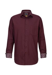 Camicia a maniche lunghe bordeaux con chiusura a bottoni, taschino sul petto e polsini a fantasia floreale. Realizzata in tessuto texture.