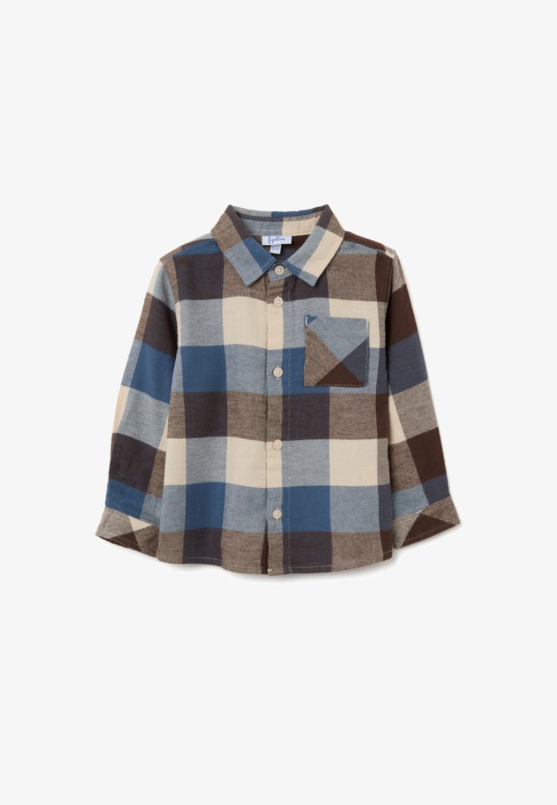 Camisa de franela en cuadros azules, marrones y beige, con mangas largas, cierre de botones y un bolsillo en el pecho. Textura suave con un corte relajado.