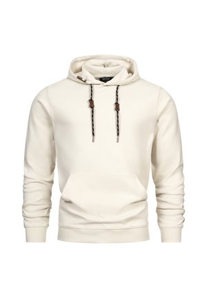 Svijetlosmeđa dukserica s teksturiranom površinom, vezicama s crno-bijelim uzorkom i smešnim kožnim detaljima. Prednji kenguru džep.