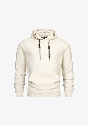 Svijetlosmeđa dukserica s teksturiranom površinom, vezicama s crno-bijelim uzorkom i smešnim kožnim detaljima. Prednji kenguru džep.