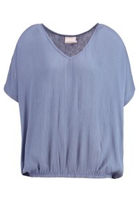 Løs, kortærmet top i lyseblå med V-hals og elastisk kant. Stoffet har en tekstureret, krøllet overflade.