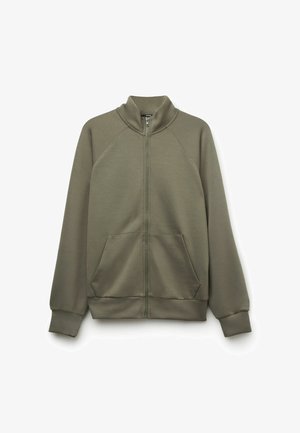 Olivgrüne Jacke mit Reißverschluss, Stehkragen, langen Ärmeln, zwei Fronttaschen sowie gerippten Bündchen und Saum.