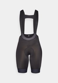 Sorte sykkelbukser med justerbare stropper, teksturert mesh-panel, polstret seteinnsats og individuelle benmanchett.