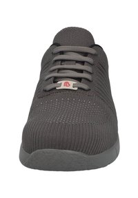 Gray fabric sneaker with a textured knit upper, lace-up design, rubber sole, and a subtle logo accent near the laces.