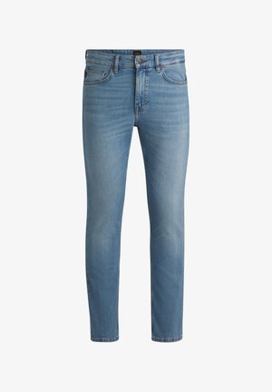 Lys blå denimjeans med slim fit, fem lommer, glidelås og subtil bleking. Materialet er mykt med en jevn tekstur.