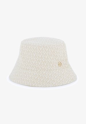 Chapeau bob en tissu crème avec un motif monogramme subtil. Dispose d'un bord légèrement incurvé et d'un accent logo en métal doré sur le côté.