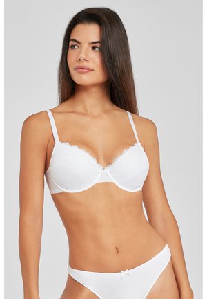 White lace-trimmed bra with adjustable straps, featuring a smooth underwire design and subtle scalloped detailing on the edges.