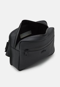 Lacoste NAOS UNISEX - Jostas soma - noir