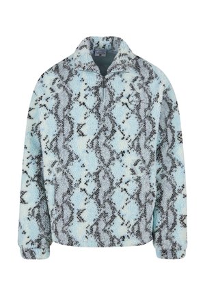 Pull en peluche bleu clair et noir à imprimé serpent, avec col montant et courte fermeture éclair. Texture douce avec manches longues.
