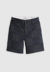 Pantalones cortos chinos para hombre en azul marino con un patrón de cuadrícula beige bordado, cierre de botón, pasadores para cinturón y bolsillos laterales, corte relajado, talla de cintura 32.