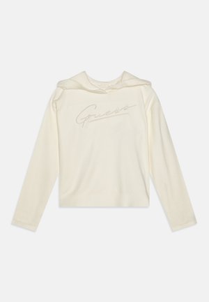 Krémová mikina s kapucí a jemnou texturou, s mírně zkráceným střihem a vyšitým nápisem v světlejším odstínu na přední straně.