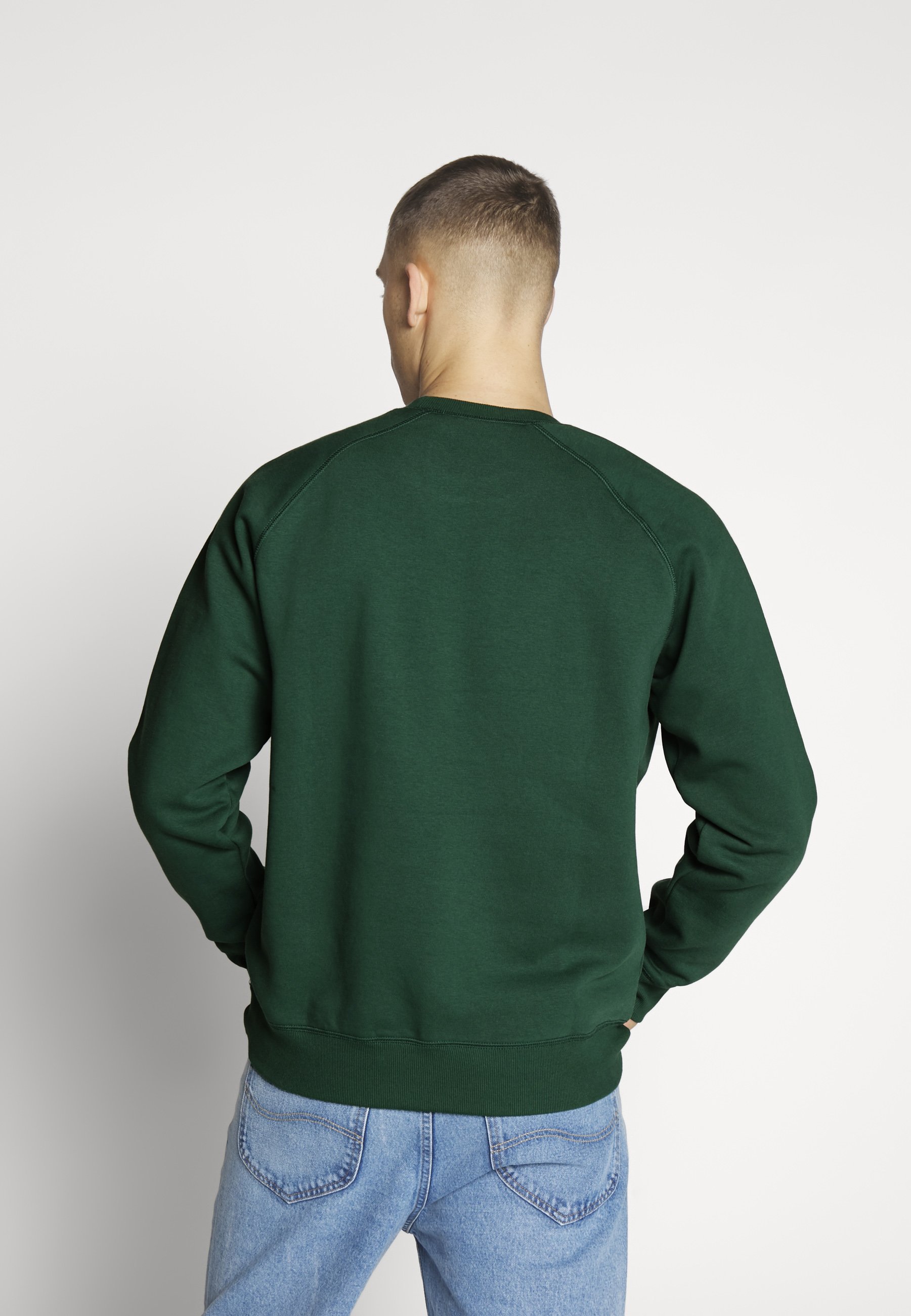 dark green sweater