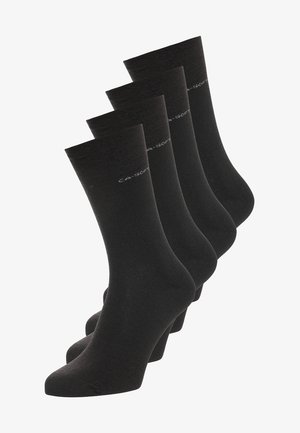 Meias de crew pretas, mistura de algodão, textura ribbed, espessura média, quatro pares, com biqueira reforçada e branding subtil na banda superior.