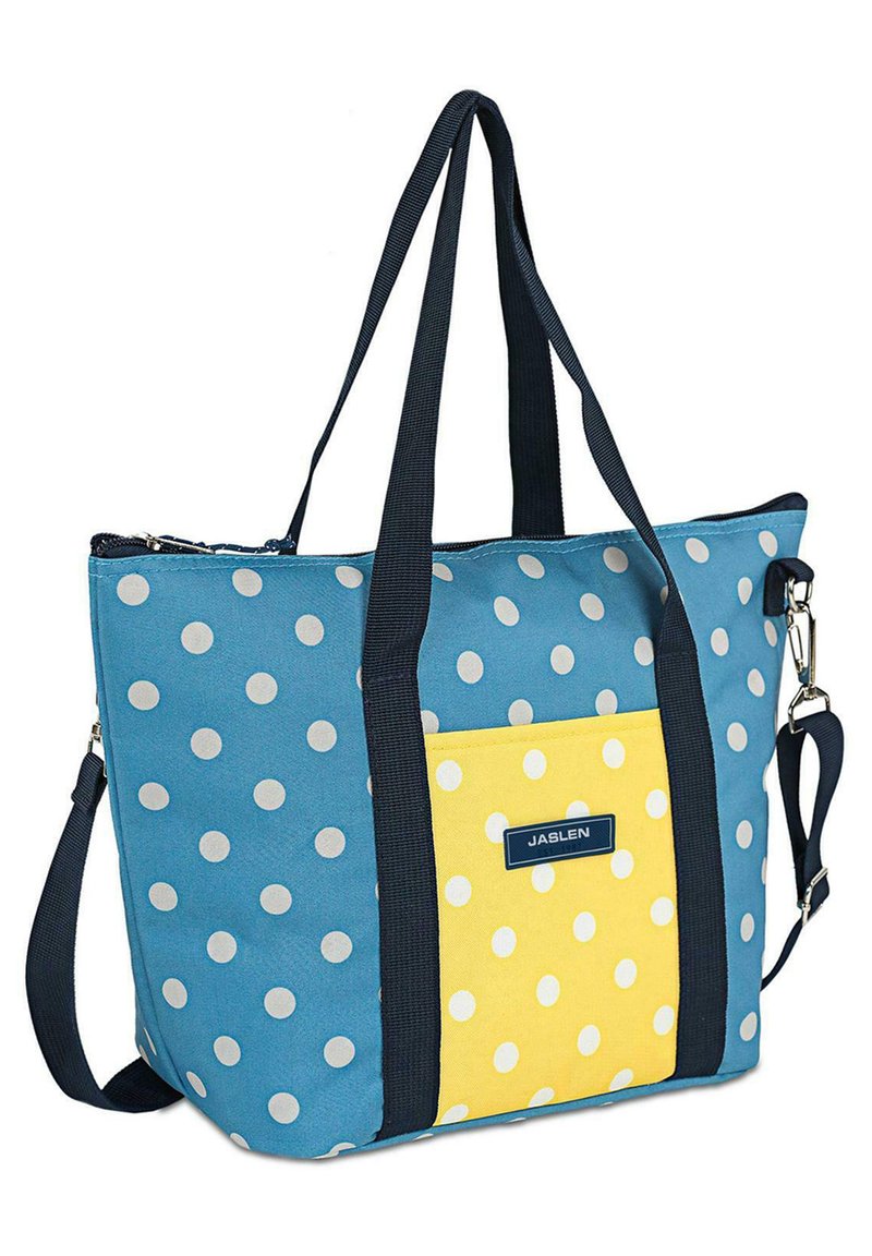Bolsa tote de lona con un cuerpo azul y lunares blancos, y un bolsillo delantero amarillo. Incluye asas negras y cierre de cremallera.